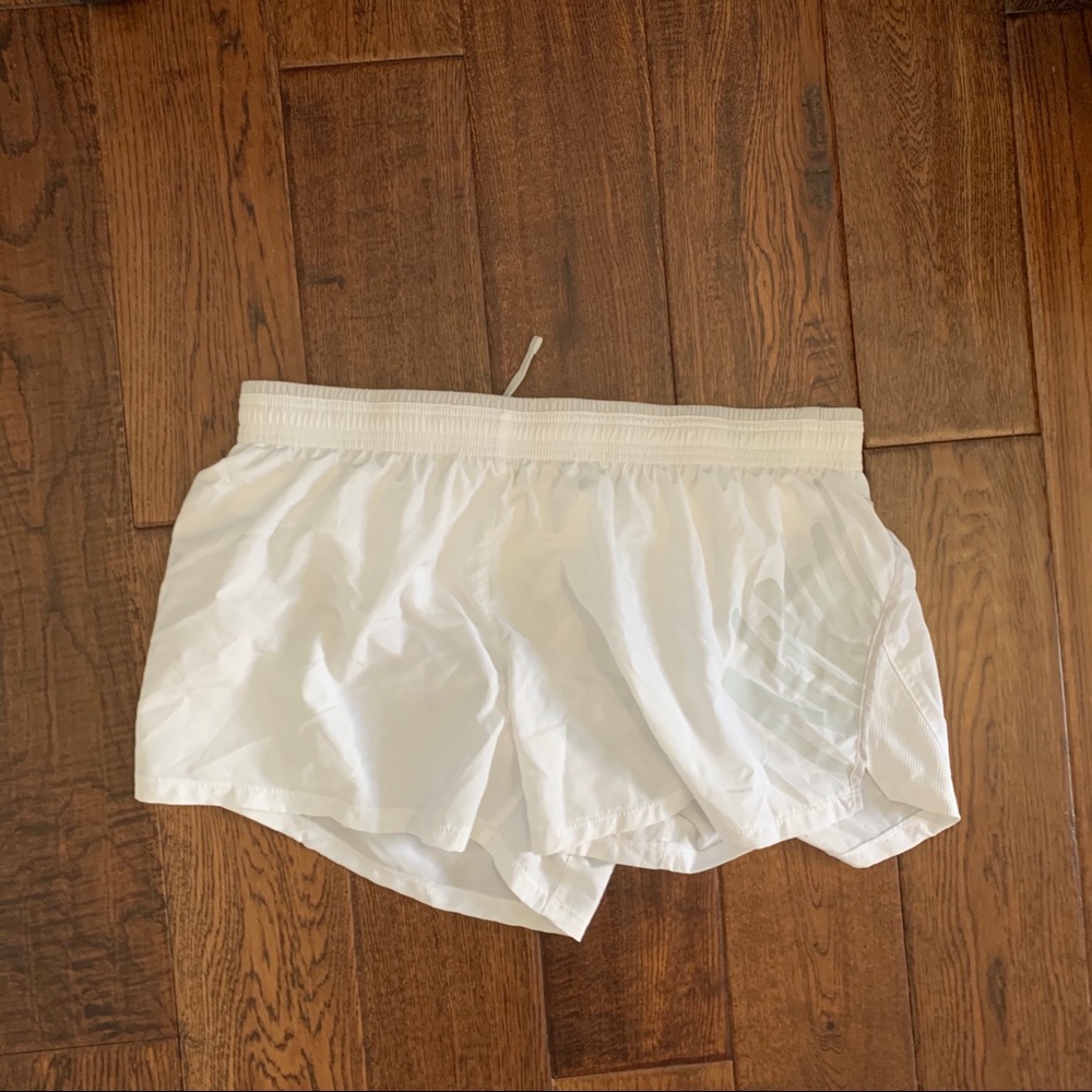 White Nike shorts